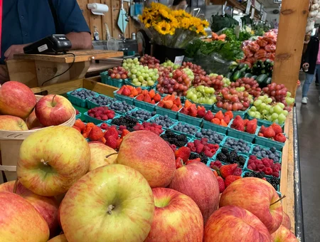 Fresh apples berries and grapes on display at Bird-in-Hand Farmers Market in Lancaster PA
