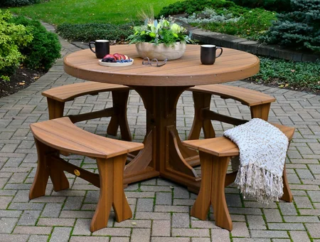 Amish crafted outdoor round table and bench set on brick patio at Cabinfield Lancaster PA