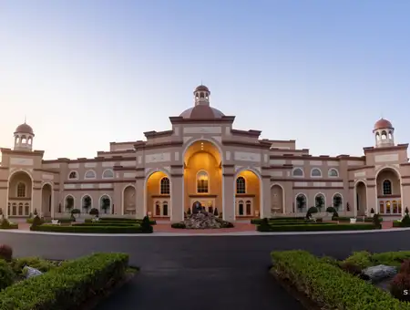 Grand exterior of Sight and Sound Theatres building at dusk in Strasburg Lancaster PA