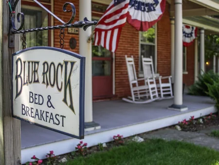 Blue Rock Bed and Breakfast sign hanging on the front porch in Lancaster PA