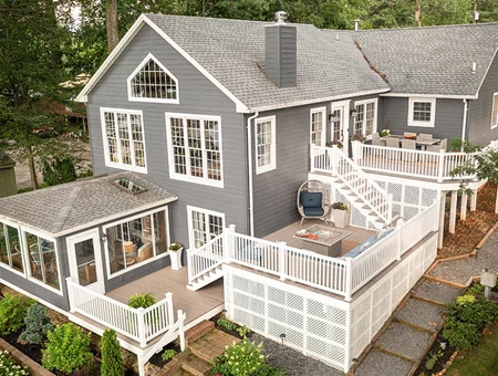 Stumps Decks and Porches multi-level deck with white railing on residential home in Lancaster PA