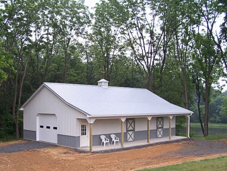 Stoltzfus Builders custom pole barn with wraparound porch and metal roof in Lancaster PA