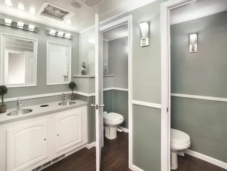Walters Services Inc bathroom remodel with gray walls and white vanity in Lancaster PA
