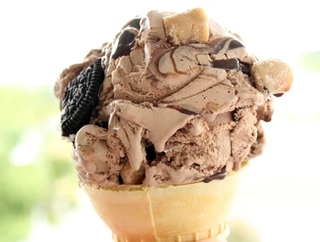 September Farm Cheese Factory and Country Market chocolate ice cream cone with Oreo toppings in Lancaster PA