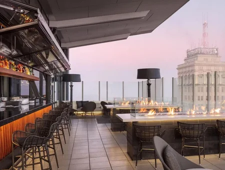 Rooftop bar with fire pit and city skyline at The Exchange, Lancaster PA