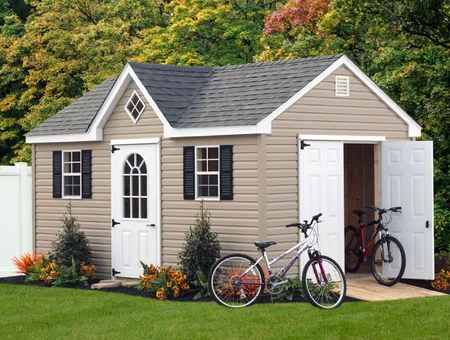 Sunrise Structures custom vinyl storage shed with bicycles and landscaping in Lancaster PA