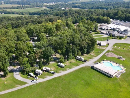 Aerial view of White Oak Campground with RV sites, pool, and wooded grounds in Lancaster County PA
