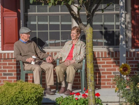 United Zion Retirement Community senior couple relaxing on porch at retirement community in Lancaster PA