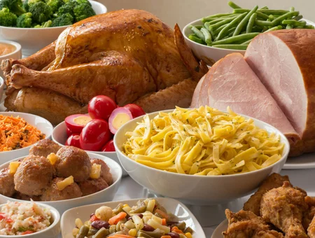 Roast turkey, sliced ham, buttered noodles, and smorgasbord sides at Bird-in-Hand Family Restaurant