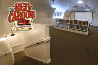 The Red Caboose Motel at Paradise Station
