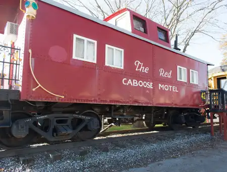 Vintage red caboose railcar at The Red Caboose Motel at Paradise Station in Lancaster PA