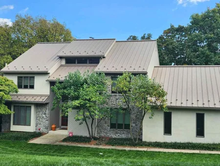 M&E Roofing metal roof installation on residential home exterior in Lancaster PA