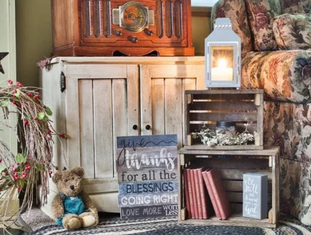 Farmhouse gift display with lantern wooden crate signs and teddy bear at Good's Store Lancaster County PA