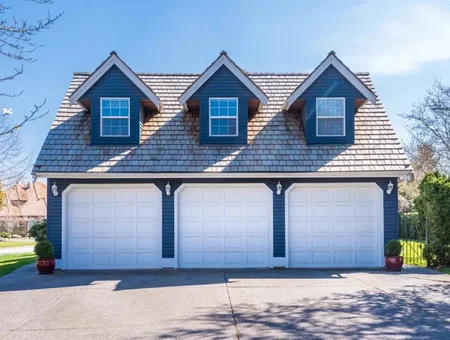 Smucker Innovations custom three car garage with dormers on residential home in Lancaster PA