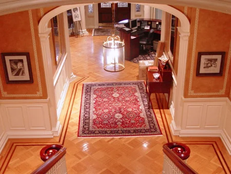 Nissly Professional Hardwood Flooring elegant parquet foyer and hardwood stair installation Lancaster PA