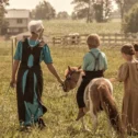 Amish children with a miniature horse on a Lancaster County PA farm