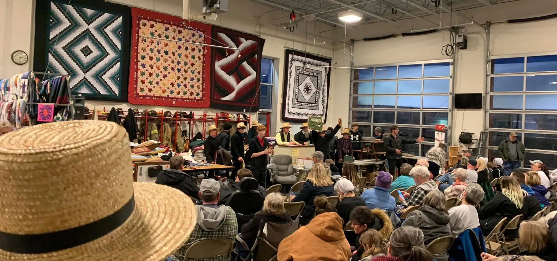 Amish quilt auction at Strasburg Spring Mud Sale in Lancaster County PA