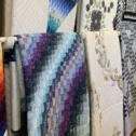 Colorful handmade Amish quilts on display at Old Country Store in Lancaster County PA