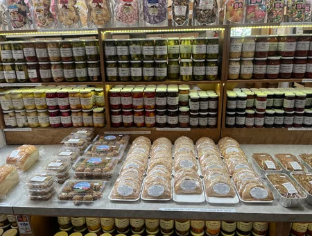 Jars of pickles and jams with fresh baked goods at Countryside Road Stand farm market in Lancaster PA