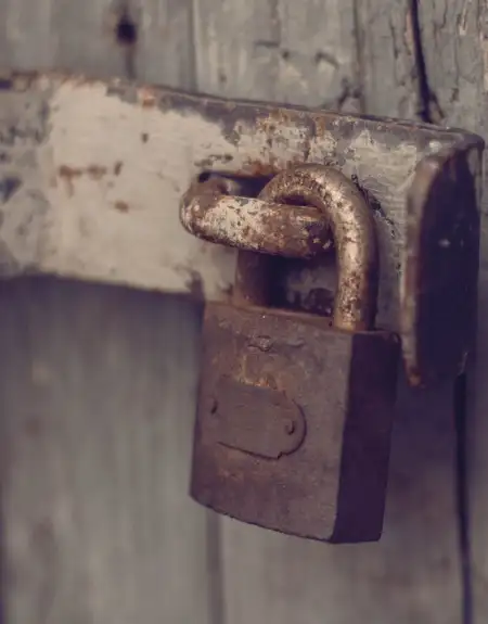Rusty padlock on a door for an escape room experience at Refreshing Mountain in Stevens Lancaster County PA