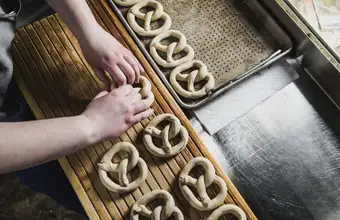 Fresh pretzels being made by hand on a factory tour in Lancaster PA