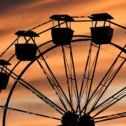 Ferris wheel silhouette at sunset at a Lancaster County PA fair or festival