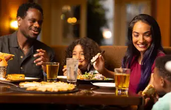 Family dining together at Eden Resort restaurant Lancaster PA - family friendly dining