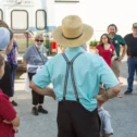 Amish guide leading a group tour at The Amish Farm and House in Lancaster PA