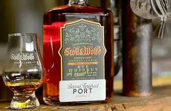 Stoll and Wolfe Distillery barrel finished port whiskey bottle and glass, Lancaster PA distillery