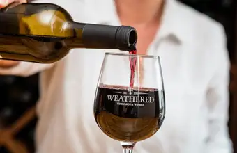 Weathered Vineyards wine being poured into a glass, winery in Lancaster PA