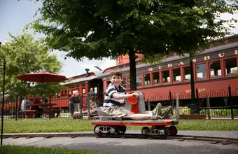Child riding a go-kart at Dutch Wonderland amusement park in Lancaster PA