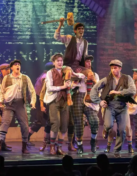 Live musical theater cast performing on stage at Dutch Apple Dinner Theatre in Lancaster PA