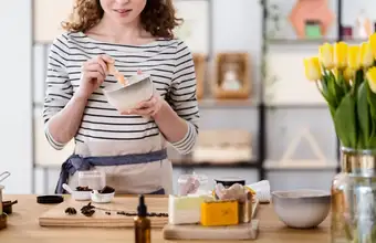 Woman mixing ingredients at a hands-on cooking or wellness class in Lancaster PA