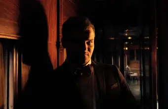 Mysterious figure in dark hallway for murder mystery experience in Lancaster PA