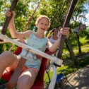 Kids riding swing ride at Dutch Wonderland amusement park in Lancaster PA