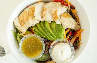 Grilled chicken salad with avocado and dressing at a Lancaster PA restaurant