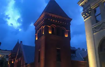 Historic Lancaster PA downtown building lit up at night, open after 5pm