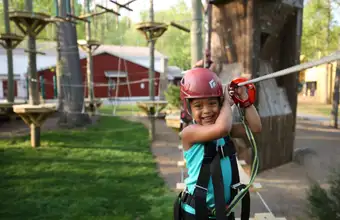 Child on zipline at outdoor adventure park in Lancaster County PA