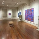 Art gallery interior with colorful paintings at Lancaster Museum of Art in Pennsylvania