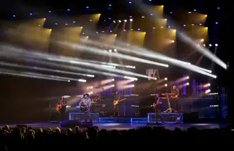 Live concert with stage lights and band performing at a Lancaster PA music venue