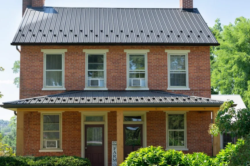 4JM Contracting historic brick farmhouse with new metal roof installation project in Lancaster PA