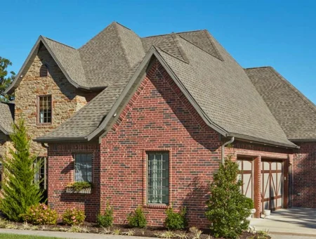 Abel & Son Roofing and Siding brick exterior home with architectural shingle roof in Lancaster PA
