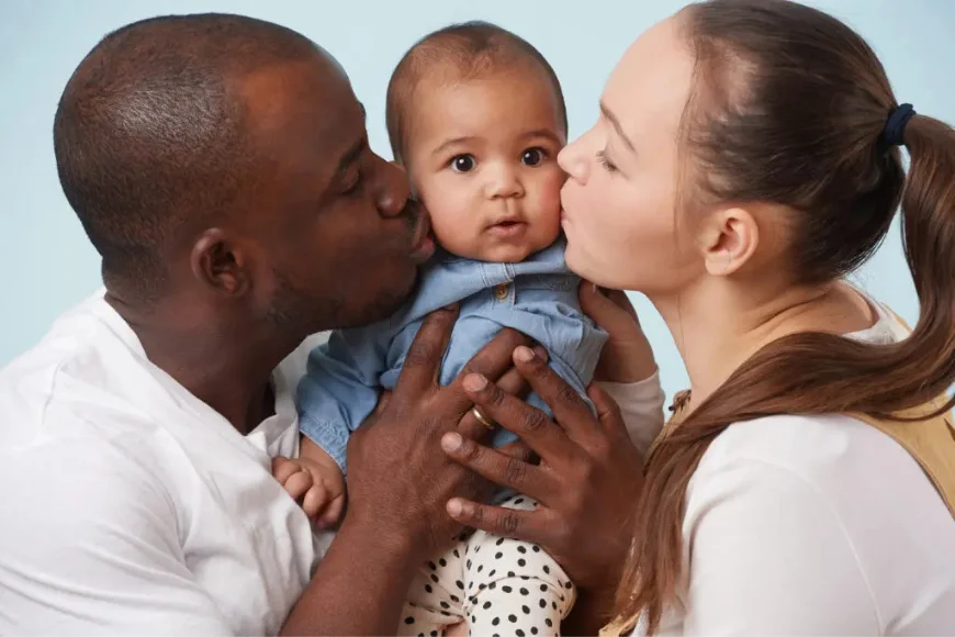 Align Pregnancy Services new parents kissing newborn baby supported by Lancaster PA pregnancy services