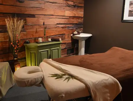 Body and Sole Reflexology spa treatment room with massage table and relaxing decor in Lancaster PA