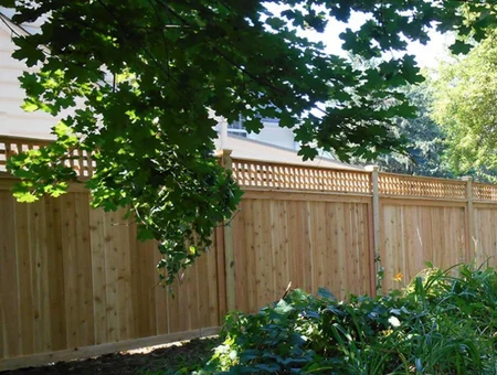 Chester County Fencing wood privacy fence with lattice top installed in Lancaster PA backyard