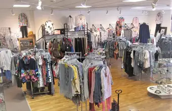 Womens clothing boutique interior with racks of apparel at Ruthies store in Lancaster County PA