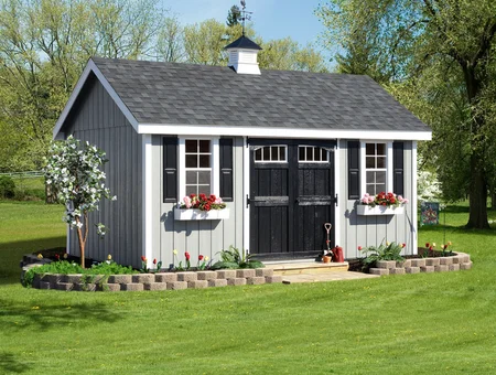 Country Tyme Sheds gray wood storage shed with cupola black double doors and flower boxes in Lancaster PA
