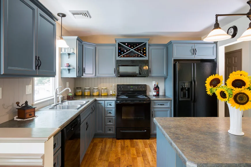 Custom kitchen cabinetry with blue-gray cabinets and granite countertops by Custom Cabinetry Unlimited in Lancaster PA
