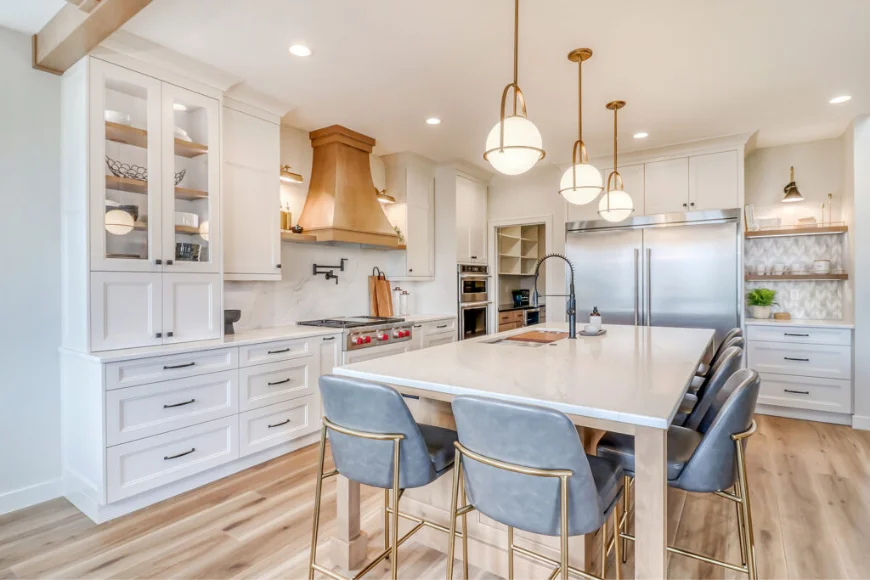 Residential kitchen electrical installation with recessed lighting and globe pendant lights over island by D.S. Burkholder Inc. in Lancaster PA