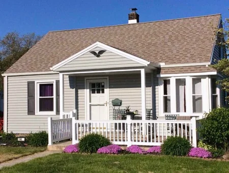 Exterior home improvement with new siding and front porch renovation by Easy Siders Home Improvement in Lancaster PA